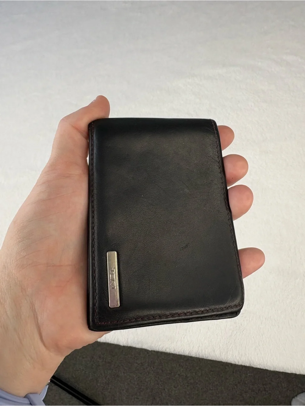 TUMI Black & Burgundy Leather Wallet